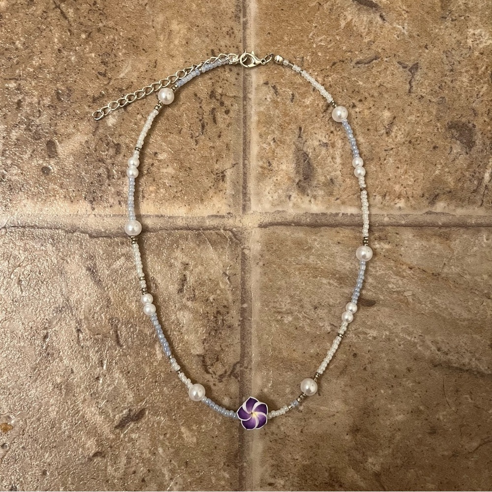 Purple plumeria flower necklace